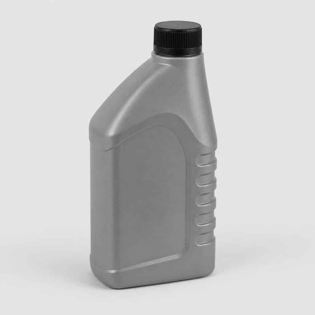 Flacon d'additif d'étanchéité pour joint de culasse sur fond clair