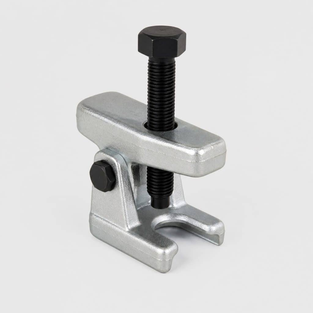 Arrache-rotule fourche en acier sur fond clair